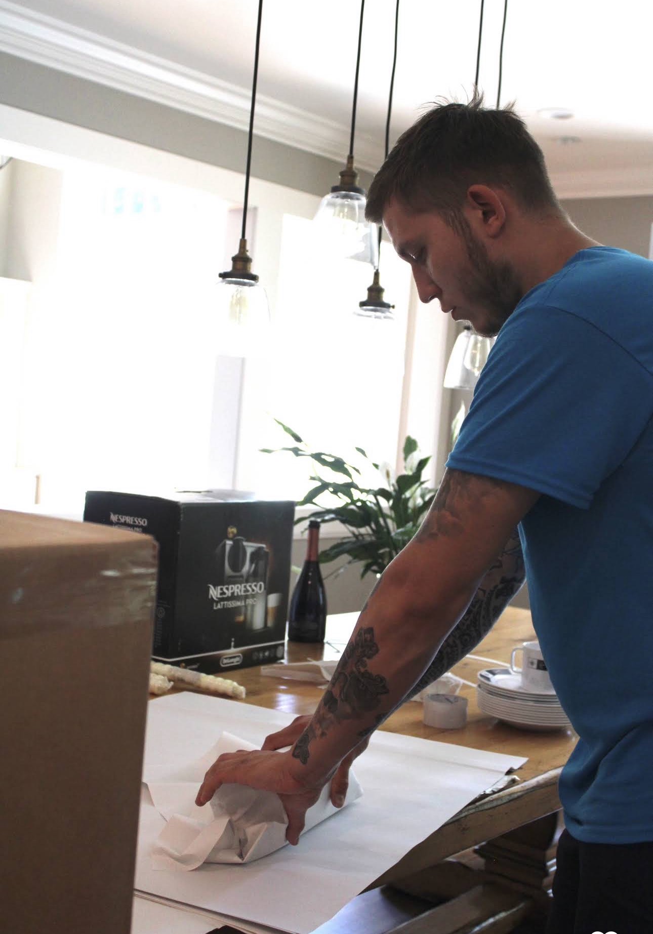 Keep Moving Oakville movers loading boxes onto a moving truck